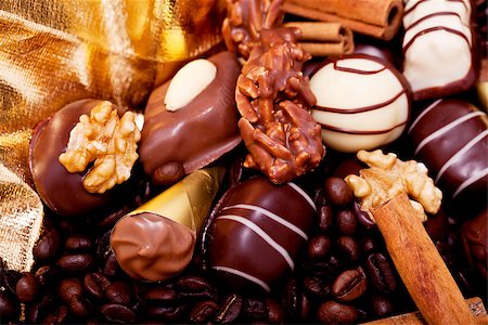 simsearch:400-04350016,k - collection of different sweet chocolate pralines closeup background present sugar Stock Photo - Budget Royalty-Free & Subscription, Code: 400-07305224