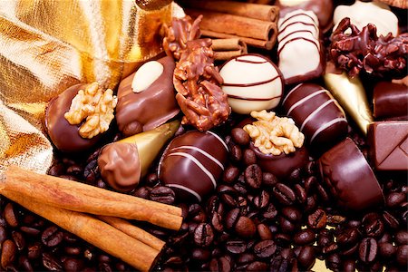 simsearch:400-04350016,k - collection of different sweet chocolate pralines closeup background present sugar Stock Photo - Budget Royalty-Free & Subscription, Code: 400-07305225