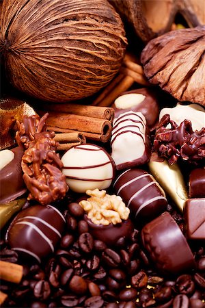 simsearch:400-04350016,k - collection of different sweet chocolate pralines closeup background present sugar Stock Photo - Budget Royalty-Free & Subscription, Code: 400-07305226