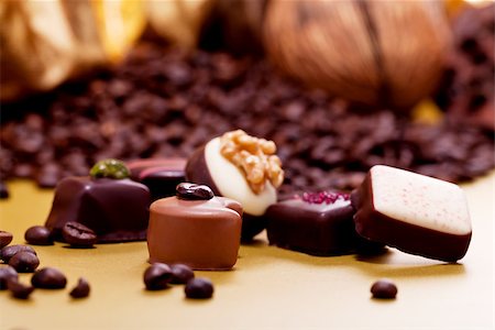 simsearch:400-04350016,k - collection of different sweet chocolate pralines closeup background present sugar Stock Photo - Budget Royalty-Free & Subscription, Code: 400-07305229
