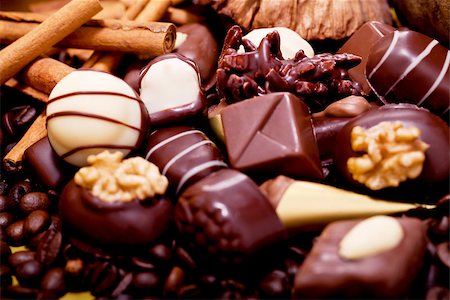 simsearch:400-04350016,k - collection of different sweet chocolate pralines closeup background present sugar Stock Photo - Budget Royalty-Free & Subscription, Code: 400-07305222