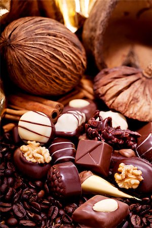 simsearch:400-04350016,k - collection of different sweet chocolate pralines closeup background present sugar Stock Photo - Budget Royalty-Free & Subscription, Code: 400-07305223