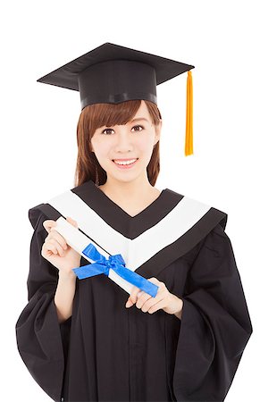 smiling Young graduate girl student with diploma Stock Photo - Budget Royalty-Free & Subscription, Code: 400-07305822