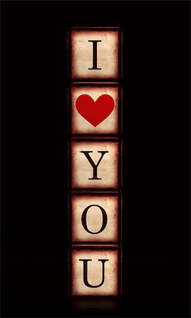 simsearch:400-05887181,k - 3d wooden cubes over black, letters makes I love you with red heart, retro concept, vertical Stock Photo - Budget Royalty-Free & Subscription, Code: 400-07306127