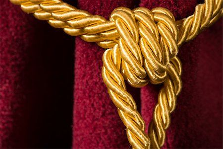 Red velvet curtain with tassel. Close up knot on rope Stock Photo - Budget Royalty-Free & Subscription, Code: 400-07308314