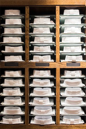 simsearch:400-04739257,k - White Shirts stacked on a shelf in a store Stock Photo - Budget Royalty-Free & Subscription, Code: 400-07300904