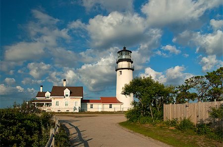 sentinel - Cape Cod (Highland) lighthouse attracts many tourists while still protecting and guiding mariners around dangerous sandbars in the area. Stock Photo - Budget Royalty-Free & Subscription, Code: 400-07301434