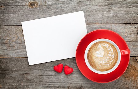 Blank valentines greeting card and red coffee cup on wooden background Stock Photo - Budget Royalty-Free & Subscription, Code: 400-07316765