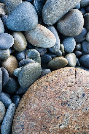 simsearch:400-04114367,k - About 20 feet up from the surf the rocks get beaten and polished by sand and logs Stock Photo - Budget Royalty-Free & Subscription, Code: 400-07319287