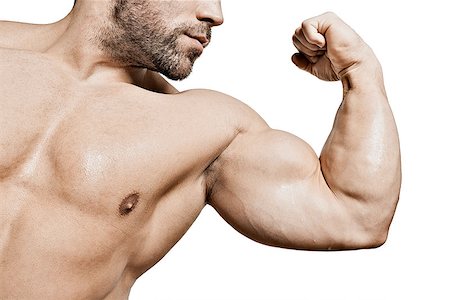 simsearch:400-07318730,k - An image of a handsome young muscular sports man flexing his bicep Stock Photo - Budget Royalty-Free & Subscription, Code: 400-07310049