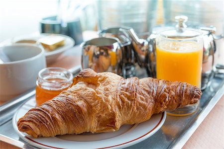 simsearch:400-05704519,k - Breakfast with coffee and croissants in a basket on table Stock Photo - Budget Royalty-Free & Subscription, Code: 400-07311966