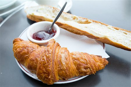 simsearch:400-05704519,k - Breakfast with coffee and croissants in a basket on table Stock Photo - Budget Royalty-Free & Subscription, Code: 400-07311970