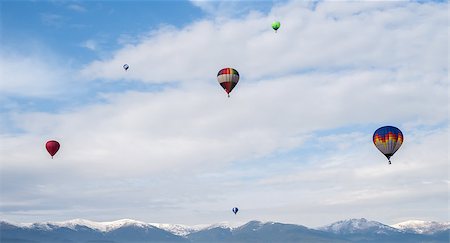 simsearch:400-06642893,k - Multicolored Balloons in the blue cloudy sky Foto de stock - Super Valor sin royalties y Suscripción, Código: 400-07324295