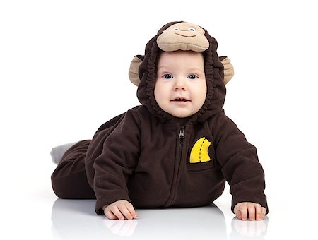 Baby boy dressed in monkey costume over white Stock Photo - Budget Royalty-Free & Subscription, Code: 400-07329336