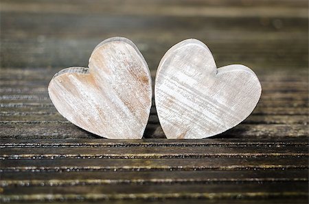 Two old wooden hearts on the wood Stock Photo - Budget Royalty-Free & Subscription, Code: 400-07322829