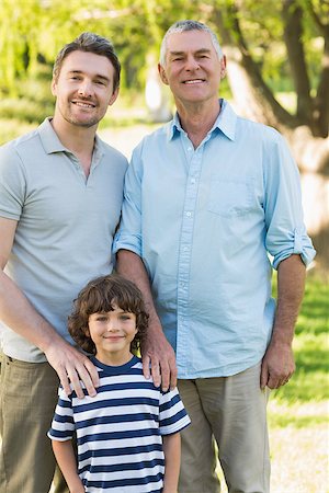 Grandfather father and son smiling against blurred background at the park Stock Photo - Budget Royalty-Free & Subscription, Code: 400-07337175