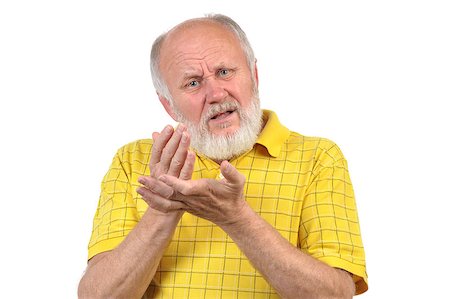 funny old people faces - angry senior bald man in yellow shirt Stock Photo - Budget Royalty-Free & Subscription, Code: 400-07337659
