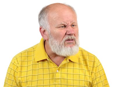 funny old people faces - disgusted displeased senior bald man in yellow shirt Stock Photo - Budget Royalty-Free & Subscription, Code: 400-07337650