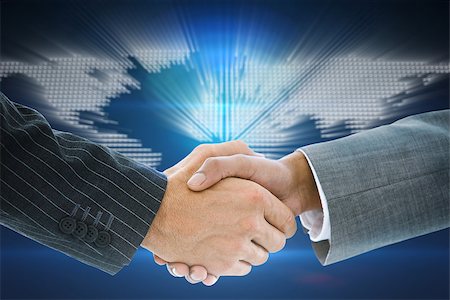 Composite image of business handshake against glowing world map on black background Stock Photo - Budget Royalty-Free & Subscription, Code: 400-07339709