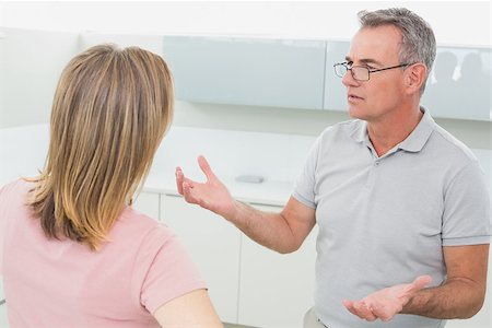 simsearch:6109-07601529,k - Unhappy couple having an argument in the kitchen at home Stock Photo - Budget Royalty-Free & Subscription, Code: 400-07339895