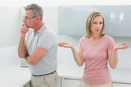 simsearch:6109-07601529,k - Unhappy couple having an argument in the kitchen at home Stock Photo - Budget Royalty-Free & Subscription, Code: 400-07339907
