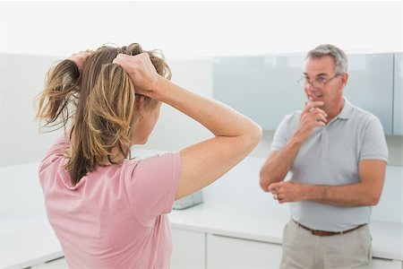 simsearch:6109-07601529,k - Unhappy couple having an argument in the kitchen at home Stock Photo - Budget Royalty-Free & Subscription, Code: 400-07339926