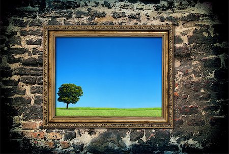 simsearch:400-07332295,k - golden wooden frame with beautiful landscape over ruined brick wal. Photo inside frame is my property. Stock Photo - Budget Royalty-Free & Subscription, Code: 400-07330887