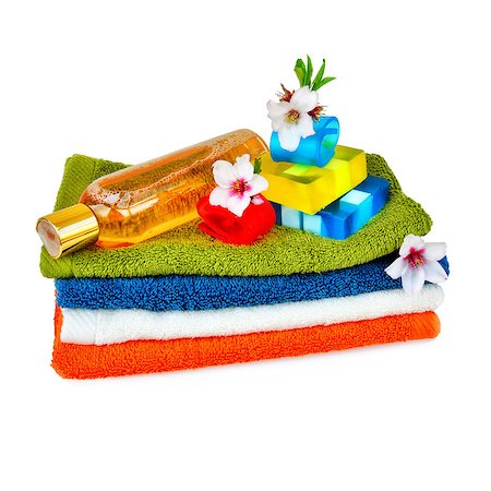 Towels, body care, natural soap and almond flowers. Composition for health and hygiene. Photographie de stock - Aubaine LD & Abonnement, Code: 400-07331756