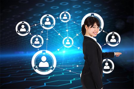 simsearch:614-02985267,k - Smiling businesswoman pointing against hexagon pattern on technical background with binary code Stock Photo - Budget Royalty-Free & Subscription, Code: 400-07344574