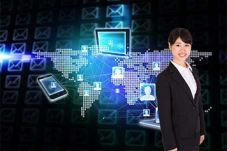 simsearch:614-02985267,k - Smiling businesswoman against glowing envelopes on black background Stock Photo - Budget Royalty-Free & Subscription, Code: 400-07344680