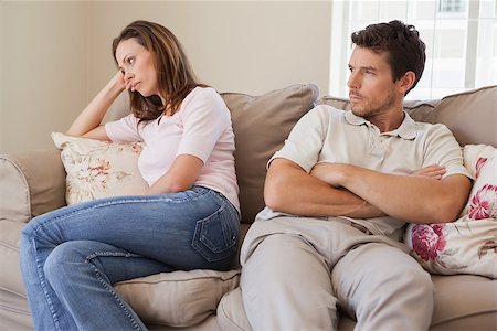 simsearch:400-07343634,k - Unhappy couple not talking after an argument in living room at home Stock Photo - Budget Royalty-Free & Subscription, Code: 400-07346049
