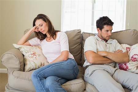 simsearch:400-07343634,k - Unhappy couple not talking after an argument in living room at home Stock Photo - Budget Royalty-Free & Subscription, Code: 400-07346884