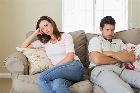 simsearch:400-07343634,k - Unhappy couple having an argument in living room at home Stock Photo - Budget Royalty-Free & Subscription, Code: 400-07346901