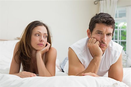 simsearch:6109-07601529,k - Unhappy couple not talking after an argument in bed at home Stock Photo - Budget Royalty-Free & Subscription, Code: 400-07347562