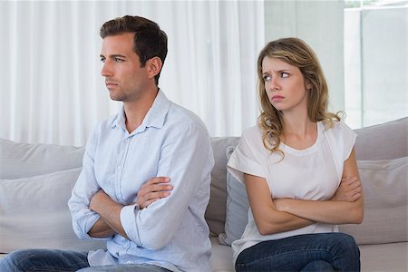 simsearch:400-07343634,k - Unhappy couple not talking after an argument in living room at home Stock Photo - Budget Royalty-Free & Subscription, Code: 400-07343192