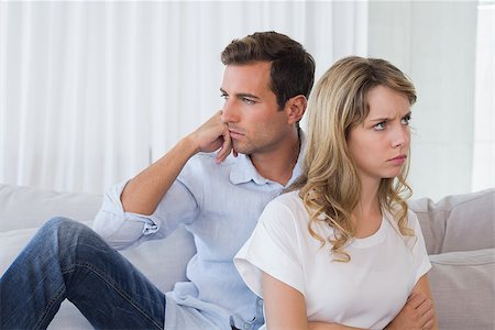 simsearch:400-07343634,k - Unhappy couple not talking after an argument in living room at home Stock Photo - Budget Royalty-Free & Subscription, Code: 400-07343232