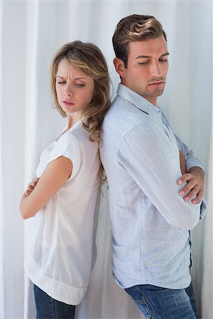 simsearch:400-07343634,k - Side view of unhappy couple not talking after an argument at home Stock Photo - Budget Royalty-Free & Subscription, Code: 400-07343501