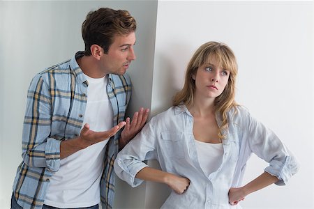 simsearch:6109-07601529,k - Unhappy couple having an argument at home Stock Photo - Budget Royalty-Free & Subscription, Code: 400-07343717
