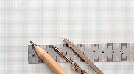 simsearch:400-04424177,k - Still life photo of engineering graph paper with pencil, compass and metal ruler blank to add your own design Stock Photo - Budget Royalty-Free & Subscription, Code: 400-07409716