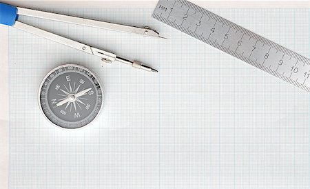 simsearch:400-04424177,k - Still life photo of engineering graph paper with pencil, compass and metal ruler blank to add your own design Stock Photo - Budget Royalty-Free & Subscription, Code: 400-07409726