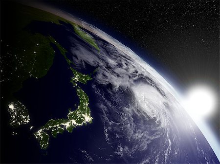 Sunrise over japanese islands viewed from space. Highly detailed planet surface with clouds and city lights. Elements of this image furnished by NASA. Stock Photo - Budget Royalty-Free & Subscription, Code: 400-07409861