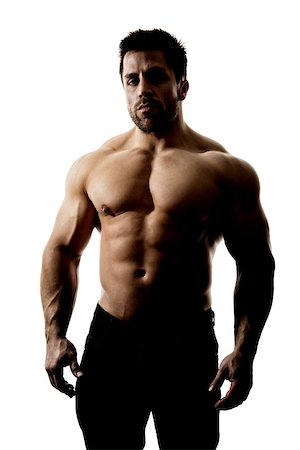 simsearch:400-07318730,k - A handsome muscular sports man hard lit with deep shadows isolated on a white background Stock Photo - Budget Royalty-Free & Subscription, Code: 400-07414292