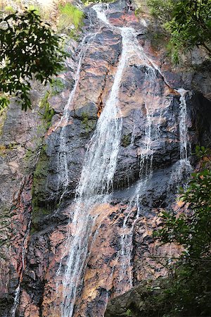 beautiful waterfall in the mountains on an exotic island Stock Photo - Budget Royalty-Free & Subscription, Code: 400-07414915