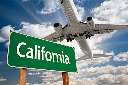 California Green Road Sign and Airplane Above with Dramatic Blue Sky and Clouds. Photographie de stock - Aubaine LD & Abonnement, Code: 400-07419102