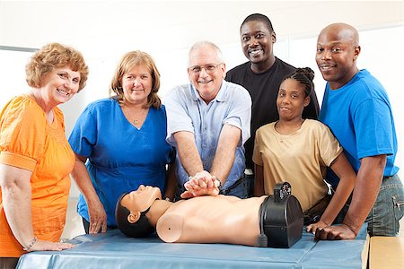 simsearch:400-07411030,k - Adult education class on CPR and First Aid.  Students and teacher with dummy. Stock Photo - Budget Royalty-Free & Subscription, Code: 400-07411018