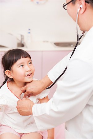 form patient - male pediatrician examining little girl Stock Photo - Budget Royalty-Free & Subscription, Code: 400-07412760