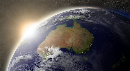 Sunset over Australia region on planet Earth viewed from space with Sun and stars in the background. Elements of this image furnished by NASA. Stock Photo - Budget Royalty-Free & Subscription, Code: 400-07412974