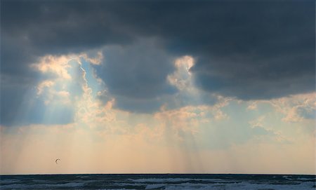 simsearch:400-07418602,k - Sun behind dark storm clouds over the sea Stock Photo - Budget Royalty-Free & Subscription, Code: 400-07425092