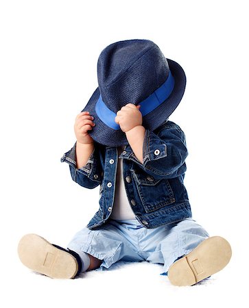 shy baby - Shy baby boy hiding behind his hat Stock Photo - Budget Royalty-Free & Subscription, Code: 400-07425429