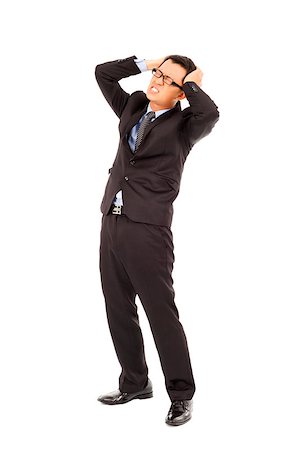 simsearch:400-04902701,k - businessman suffering from stress and a headache Stock Photo - Budget Royalty-Free & Subscription, Code: 400-07425942